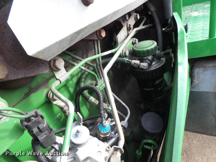 image for item K5597 2002 John Deere 6420 MFWD tractor