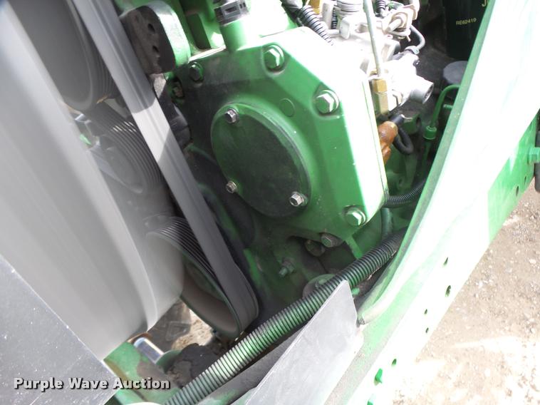 image for item K5597 2002 John Deere 6420 MFWD tractor