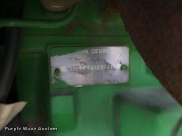 image for item K5597 2002 John Deere 6420 MFWD tractor