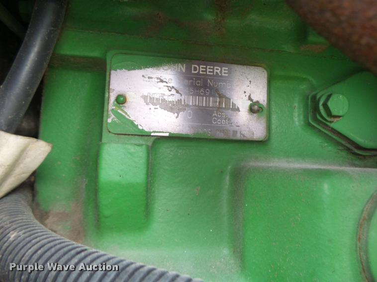 image for item K5597 2002 John Deere 6420 MFWD tractor