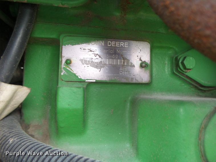 image for item K5597 2002 John Deere 6420 MFWD tractor