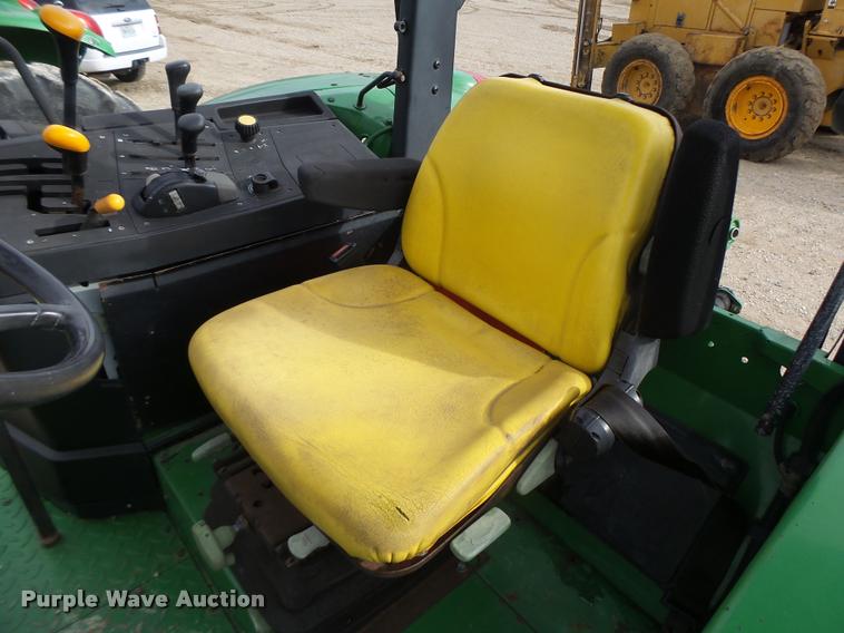 image for item K5597 2002 John Deere 6420 MFWD tractor