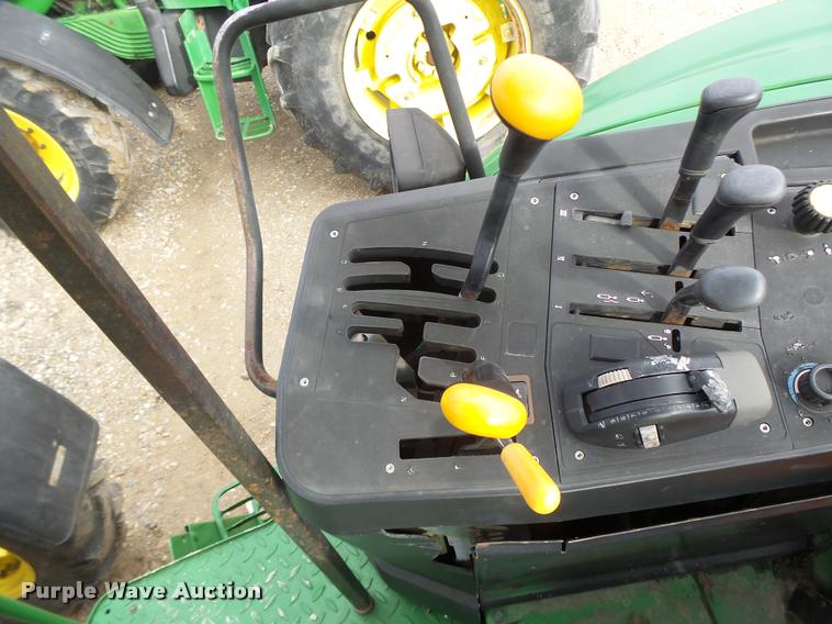 image for item K5597 2002 John Deere 6420 MFWD tractor