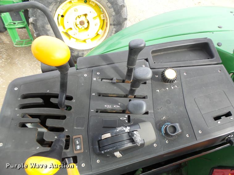 image for item K5597 2002 John Deere 6420 MFWD tractor