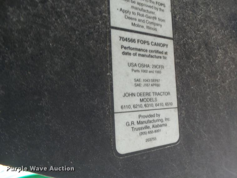 image for item K5597 2002 John Deere 6420 MFWD tractor