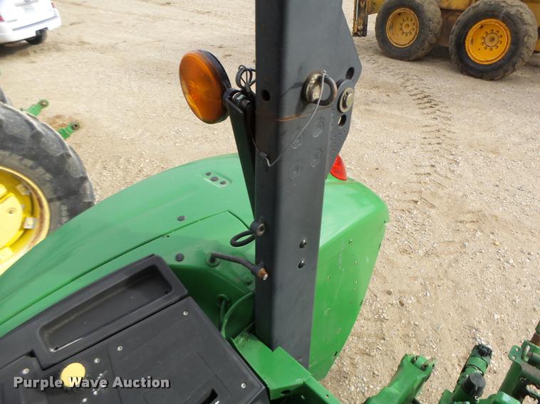 image for item K5597 2002 John Deere 6420 MFWD tractor