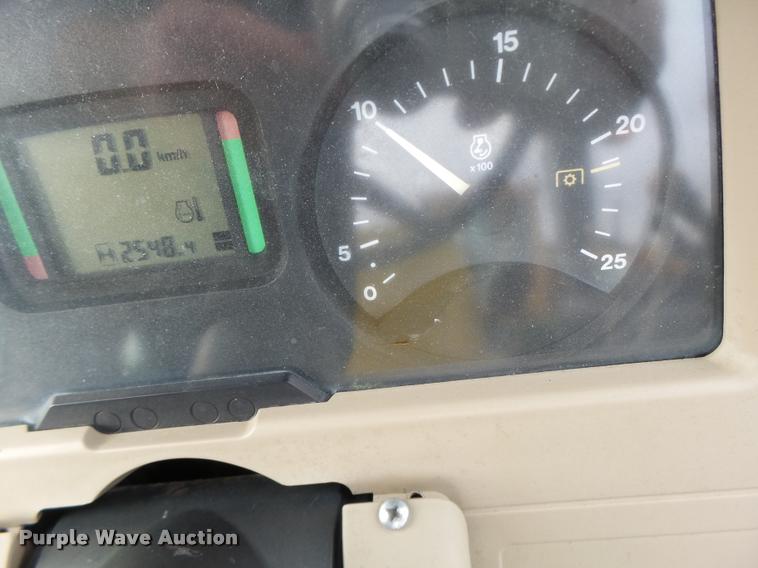 image for item K5597 2002 John Deere 6420 MFWD tractor