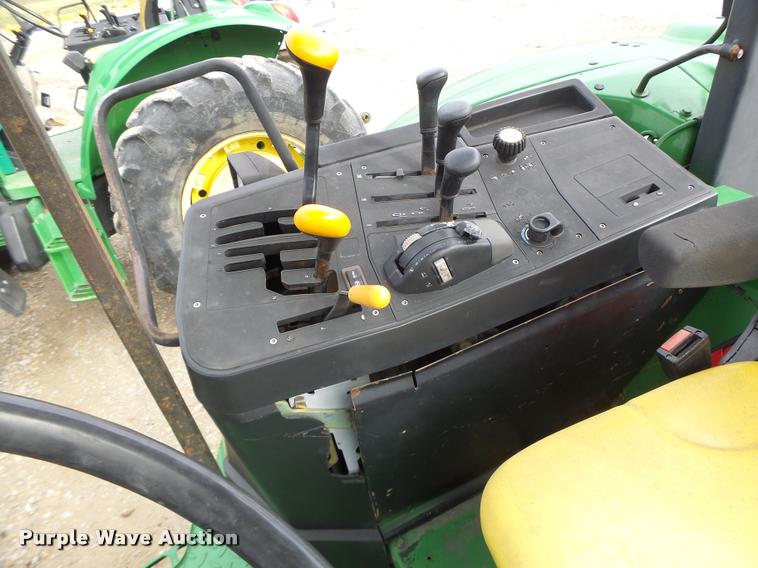 image for item K5597 2002 John Deere 6420 MFWD tractor