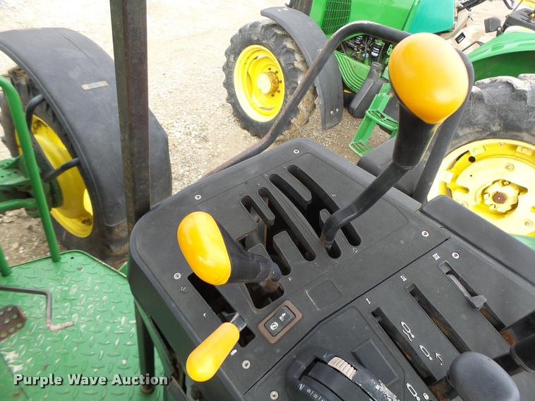 image for item K5597 2002 John Deere 6420 MFWD tractor