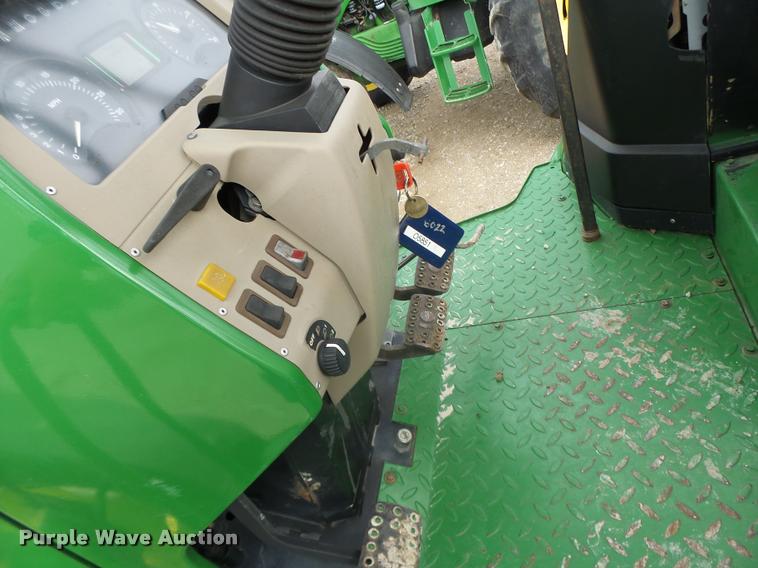 image for item K5597 2002 John Deere 6420 MFWD tractor