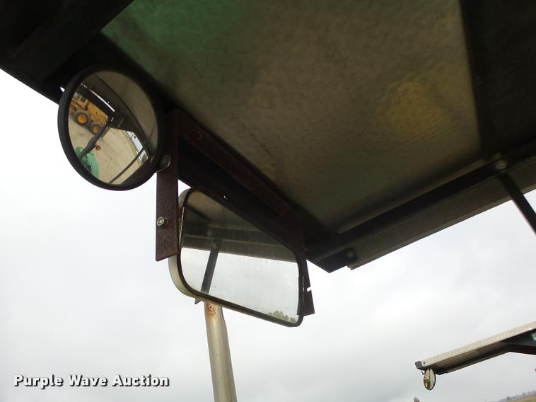 image for item K5597 2002 John Deere 6420 MFWD tractor