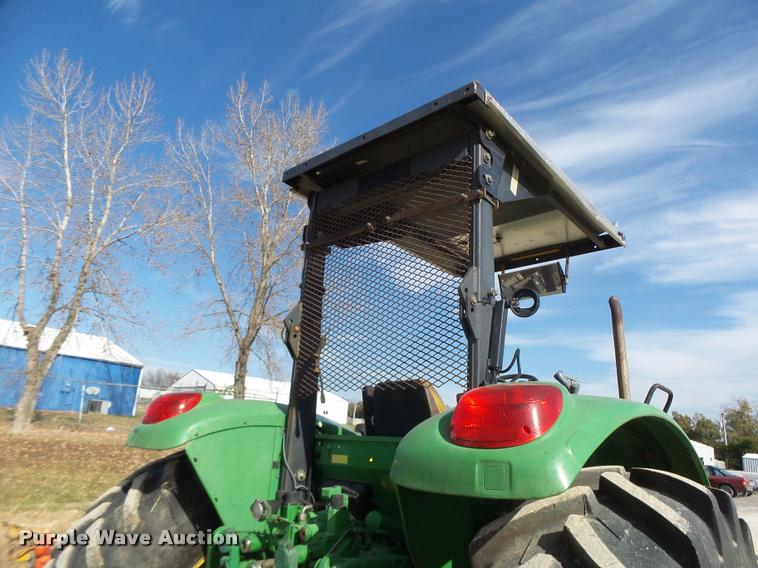 image for item K5633 2003 John Deere 6420 MFWD tractor