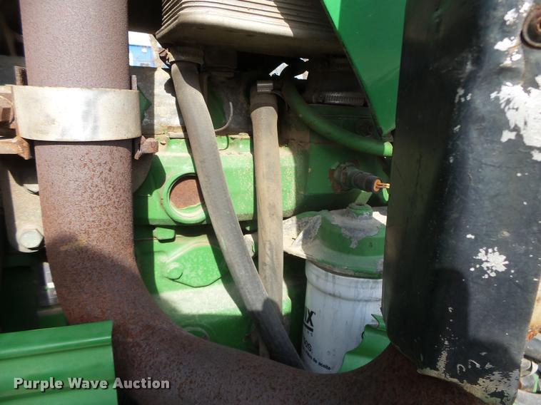 image for item K5633 2003 John Deere 6420 MFWD tractor