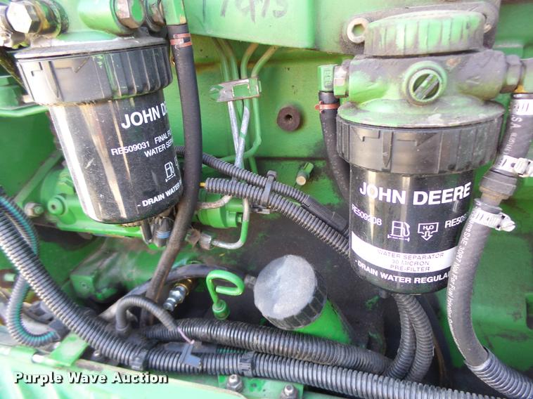 image for item K5633 2003 John Deere 6420 MFWD tractor