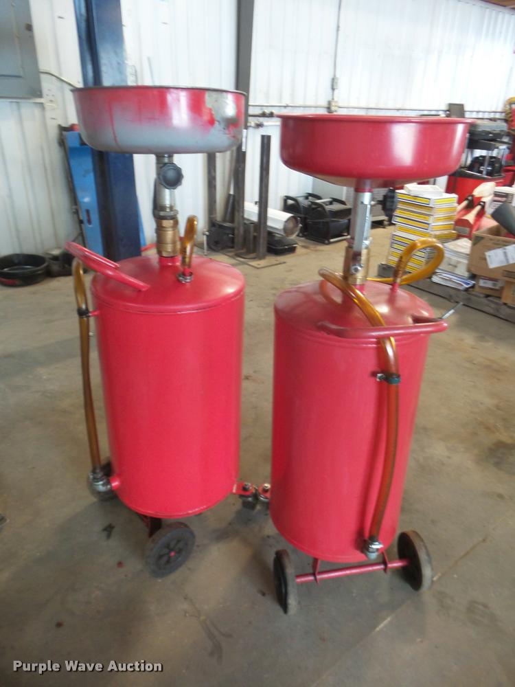 image for item DA9513 (2) fluid drain tanks