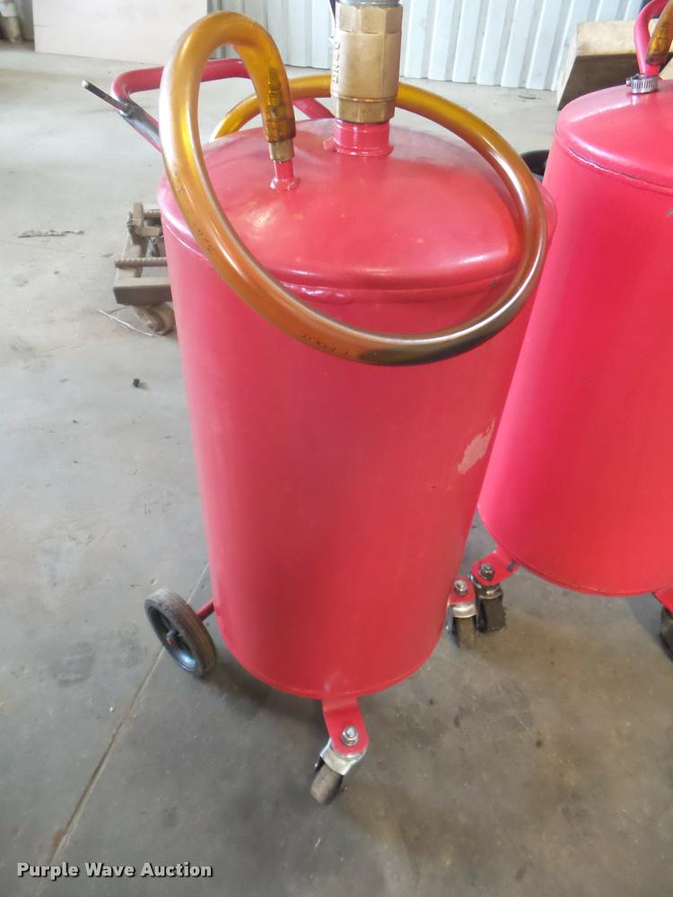 image for item DA9513 (2) fluid drain tanks