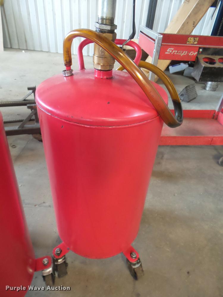 image for item DA9513 (2) fluid drain tanks