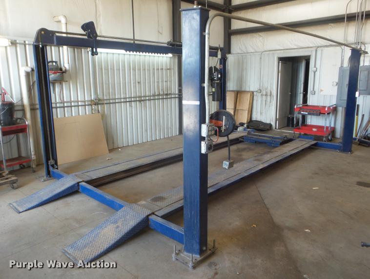 Worth 12000E four post automotive lift in Quinter, KS Item DA9569 sold Purple Wave