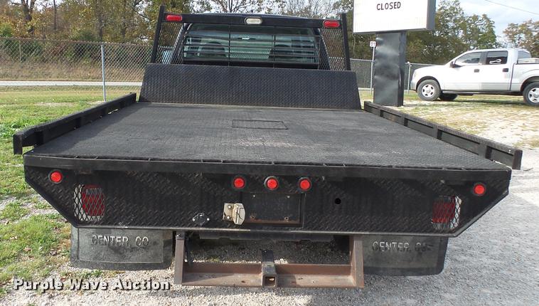 image for item K1055 2000 Ford F350 Super Duty Crew Cab flatbed pickup truck