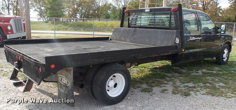 image for item K1055 2000 Ford F350 Super Duty Crew Cab flatbed pickup truck