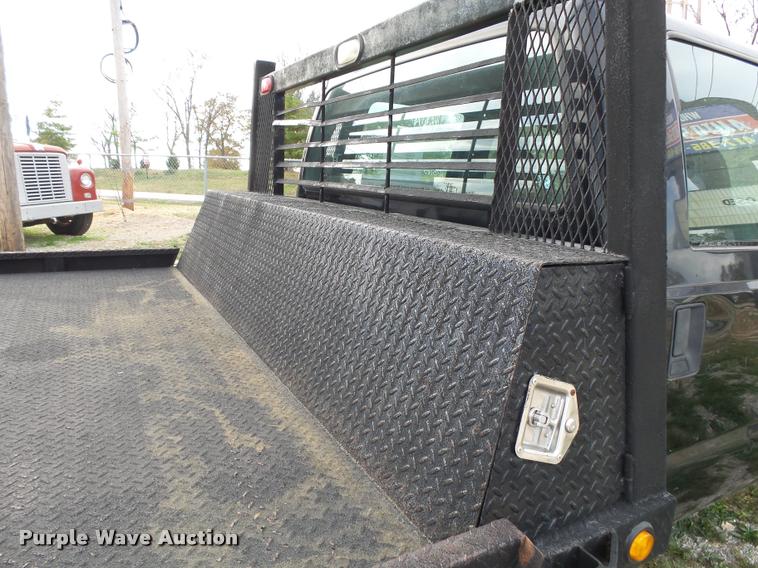image for item K1055 2000 Ford F350 Super Duty Crew Cab flatbed pickup truck