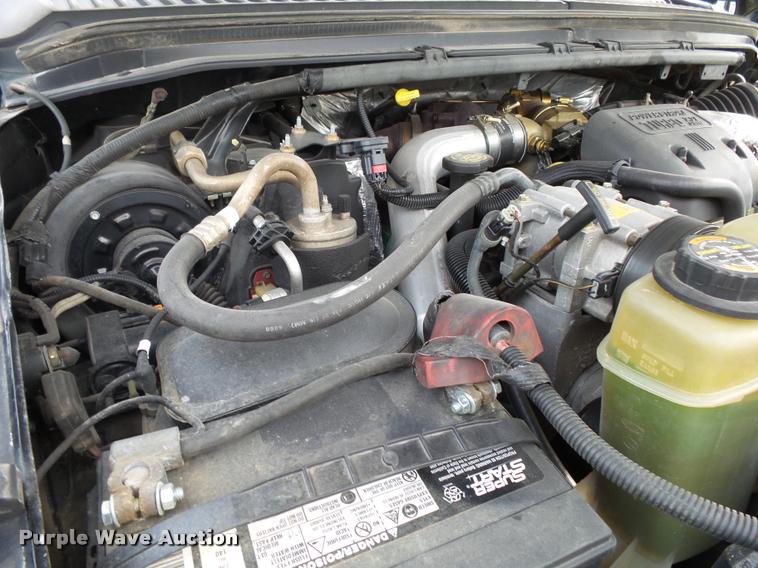 image for item K1055 2000 Ford F350 Super Duty Crew Cab flatbed pickup truck