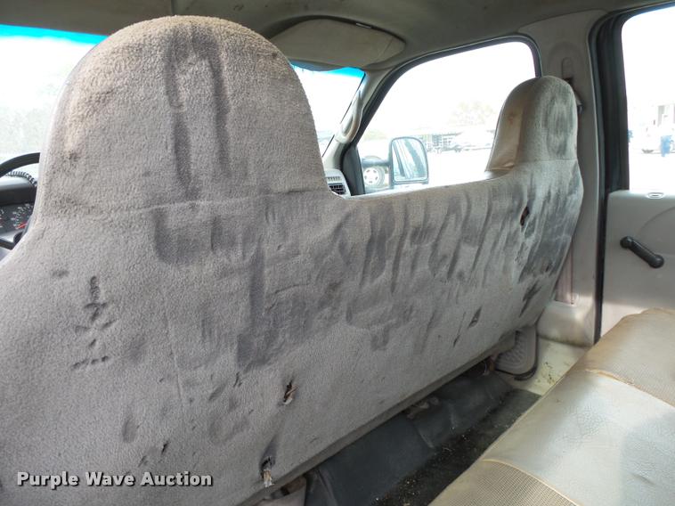 image for item K1055 2000 Ford F350 Super Duty Crew Cab flatbed pickup truck