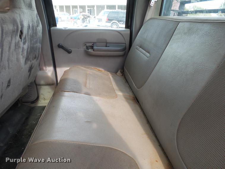 image for item K1055 2000 Ford F350 Super Duty Crew Cab flatbed pickup truck