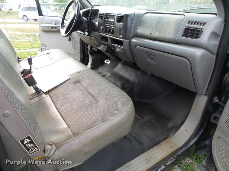 image for item K1055 2000 Ford F350 Super Duty Crew Cab flatbed pickup truck