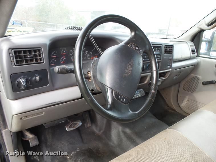 image for item K1055 2000 Ford F350 Super Duty Crew Cab flatbed pickup truck