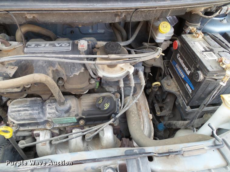 image for item K8085 2006 Dodge Caravan van