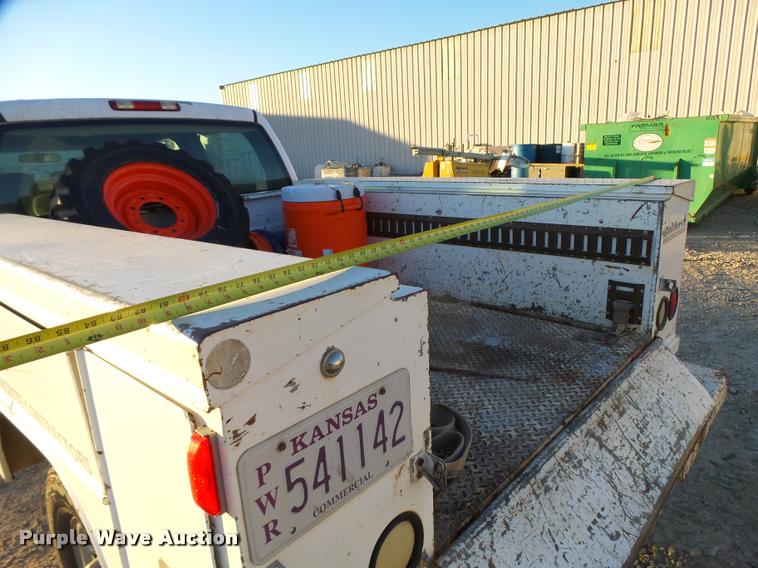 image for item L3446 2006 GMC Sierra 2500HD Crew Cab utility truck