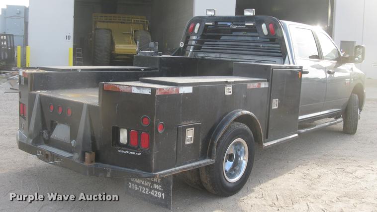 image for item L3902 2011 Dodge Ram 3500HD SLT Crew Cab flatbed pickup truck