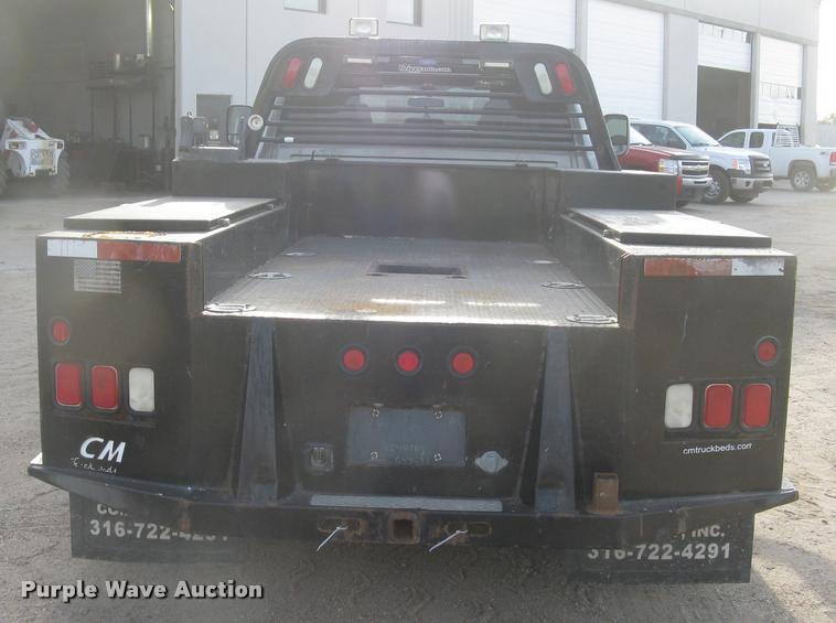 image for item L3902 2011 Dodge Ram 3500HD SLT Crew Cab flatbed pickup truck