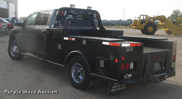 image for item L3902 2011 Dodge Ram 3500HD SLT Crew Cab flatbed pickup truck