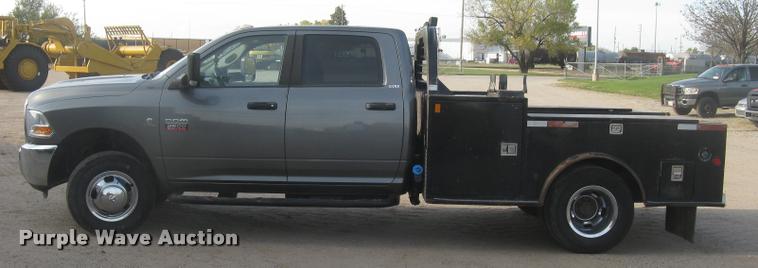 image for item L3902 2011 Dodge Ram 3500HD SLT Crew Cab flatbed pickup truck