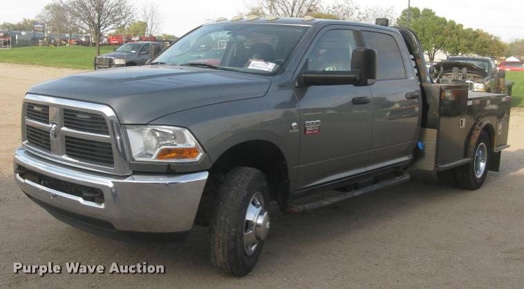 image for item L3902 2011 Dodge Ram 3500HD SLT Crew Cab flatbed pickup truck