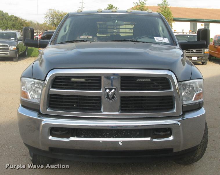 image for item L3902 2011 Dodge Ram 3500HD SLT Crew Cab flatbed pickup truck