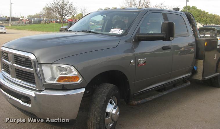 image for item L3902 2011 Dodge Ram 3500HD SLT Crew Cab flatbed pickup truck
