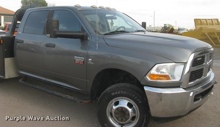 image for item L3902 2011 Dodge Ram 3500HD SLT Crew Cab flatbed pickup truck