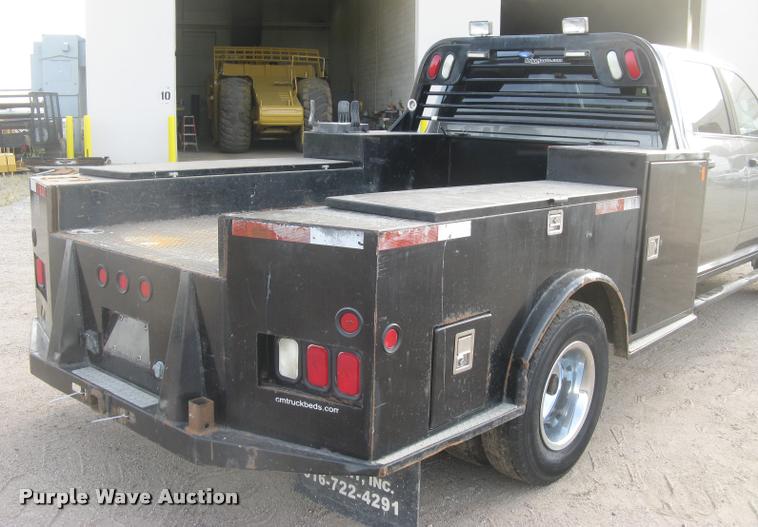 image for item L3902 2011 Dodge Ram 3500HD SLT Crew Cab flatbed pickup truck