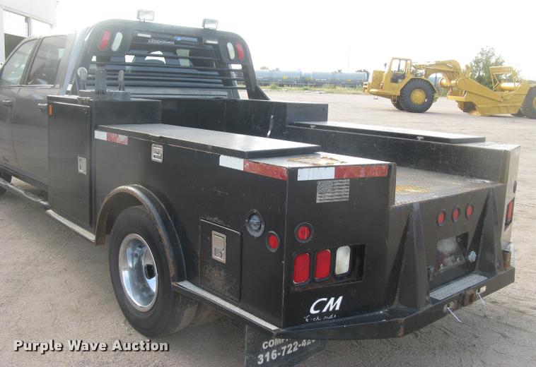 image for item L3902 2011 Dodge Ram 3500HD SLT Crew Cab flatbed pickup truck