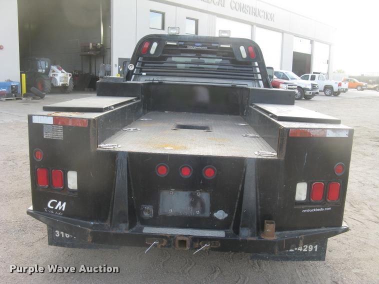 image for item L3902 2011 Dodge Ram 3500HD SLT Crew Cab flatbed pickup truck