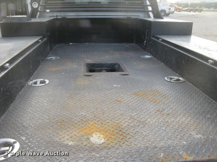 image for item L3902 2011 Dodge Ram 3500HD SLT Crew Cab flatbed pickup truck