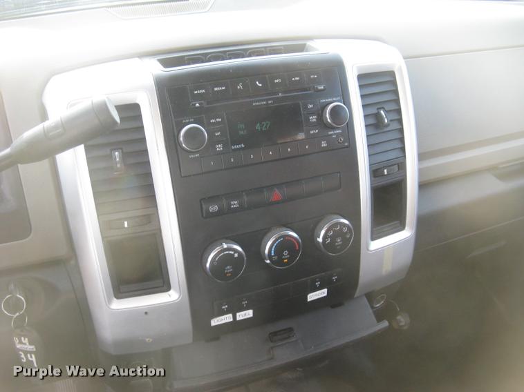 image for item L3902 2011 Dodge Ram 3500HD SLT Crew Cab flatbed pickup truck