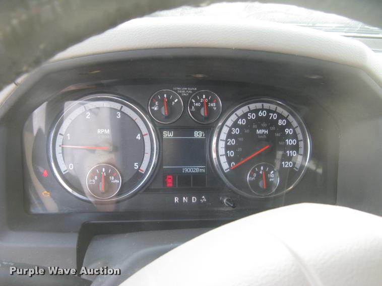 image for item L3902 2011 Dodge Ram 3500HD SLT Crew Cab flatbed pickup truck