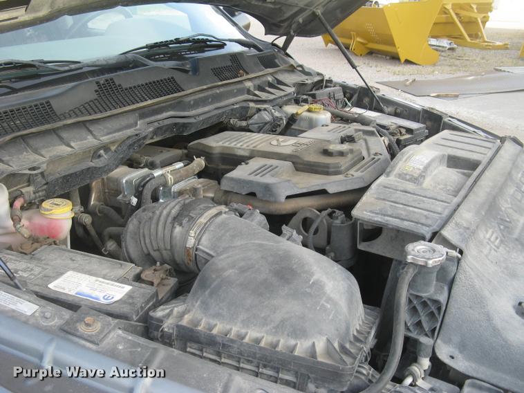 image for item L3902 2011 Dodge Ram 3500HD SLT Crew Cab flatbed pickup truck