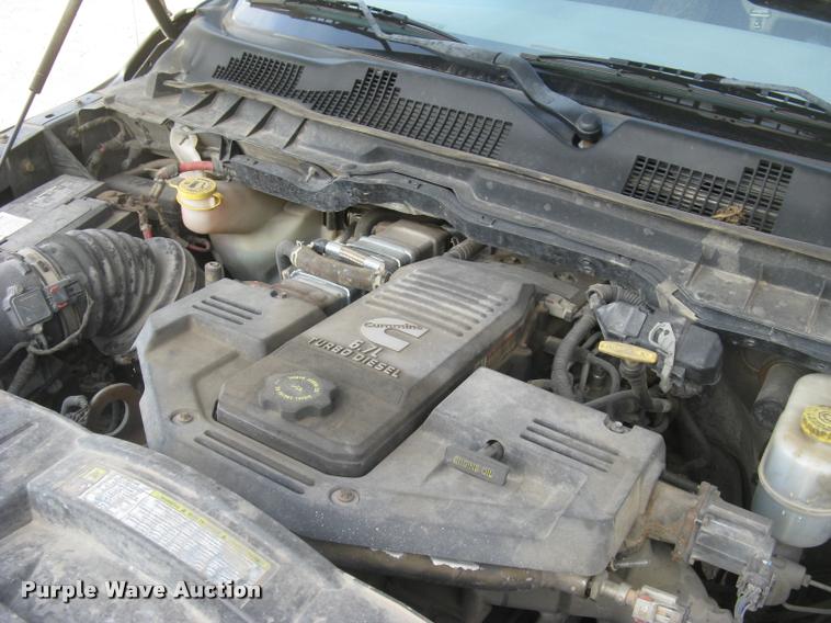 image for item L3902 2011 Dodge Ram 3500HD SLT Crew Cab flatbed pickup truck