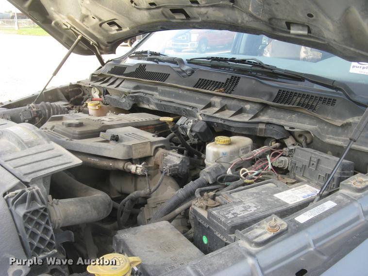 image for item L3902 2011 Dodge Ram 3500HD SLT Crew Cab flatbed pickup truck