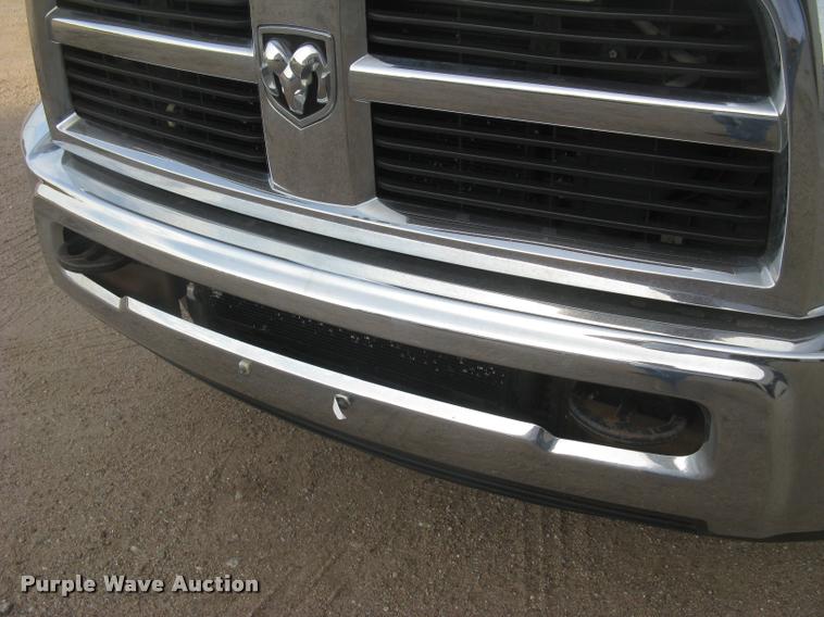 image for item L3902 2011 Dodge Ram 3500HD SLT Crew Cab flatbed pickup truck